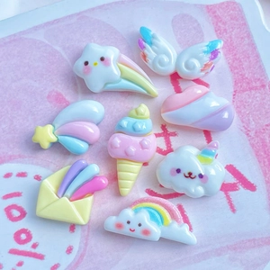 Colorful resin DIY charms set with rainbow clouds, ice cream, and angel wings for crafts
