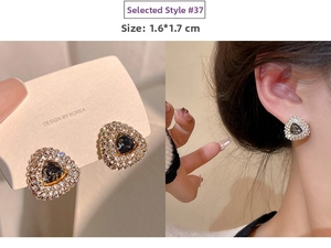 Detail showing 1.6*1.7CM dimensions of triangle tassel earrings with grey stones