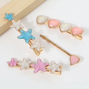 Cute 4-piece set of pink heart and flower hair clips with gold alloy and resin finish