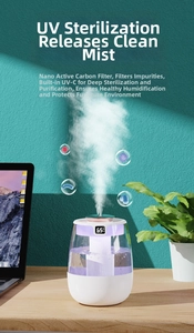 Detail view of air humidifier with digital humidity display and purple UV light on wood
