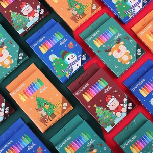 Close-up of 8-color Christmas crayon set with festive illustrations for kid's art projects