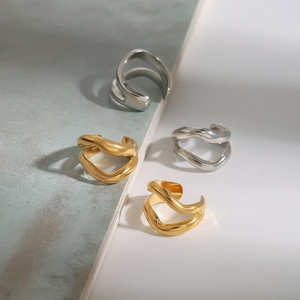 Minimalist 18K gold and silver wave-shaped ear cuffs with hollow stainless steel lines