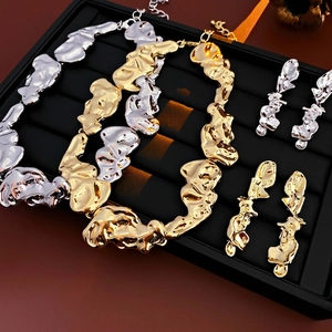 Modern irregular lava texture gold and silver jewelry set with necklaces and earrings