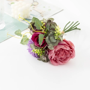 Mix of faux pink and deep red peonies with eucalyptus leaves for wedding home decor