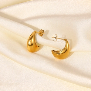 Detailed view of chunky hollow teardrop earrings in 18K PVD gold plated stainless steel