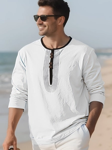 Detail of white linen-texture Henley shirt featuring black trim neckline and three buttons