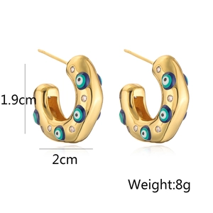 Irregular C-shaped gold hoop earrings with evil eye enamel details, 1.9cm height and 2cm width