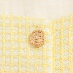French style short tweed jacket in cheese yellow with a textured golden button detail
