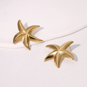 Minimalist gold plated starfish stud earrings in stainless steel with a metallic finish