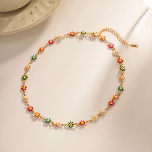 18K gold plated stainless steel necklace featuring colorful enamel daisy flower charms