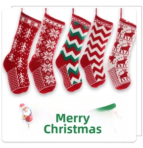 Detail of five-piece knitted Christmas stockings with snowflake and reindeer embroidery patterns