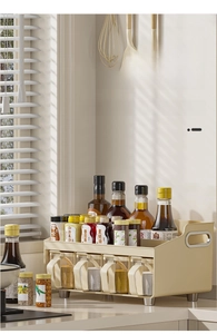 Close-up of double-tier cream storage rack with four transparent seasoning drawers