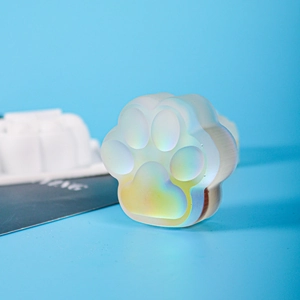 Iridescent cat paw mold decor with frosted finish and shifting pastel colors