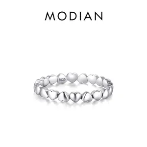Minimalist S925 sterling silver ring featuring a continuous heart pattern design