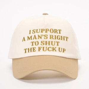 Two-tone baseball cap in beige and khaki with bold embroidered slogan on the front