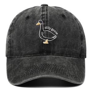 Washed black baseball cap with cartoon silly goose embroidery and curved brim