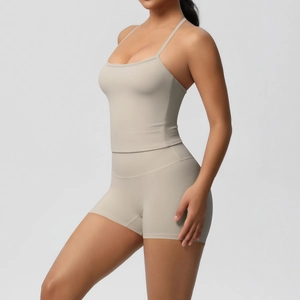 Detail of light khaki two-piece yoga set showing side profile and high waist stretch fabric