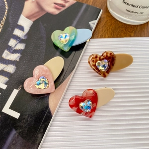 Colorful acetate heart hair clips with rhinestones in pink green and leopard print