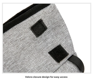Detail of grey oxford fabric bag featuring secure velcro closure and durable nylon binding