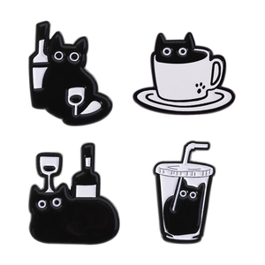 Creative cartoon cat enamel pins set featuring black and white cats in coffee cups and wine