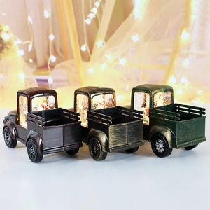 Vintage Christmas truck lanterns with LED light and snow globe effect in three retro colors
