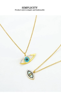 Close-up of golden evil eye necklaces with blue enamel and sparkling cubic zirconia stones