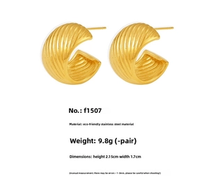 Detailed view of gold-plated C-shaped earrings with spiral texture and size measurements