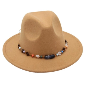 Close-up of khaki wool fedora hat featuring colorful bohemian beaded hat band decoration