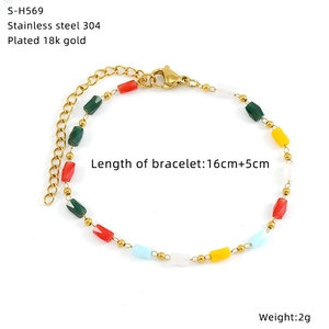 Detailed view of 18k gold plated stainless steel bracelet with colorful glass beads