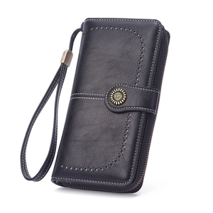 Black long leather wallet with retro buckle and white stitching on white background