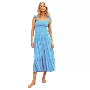 Light blue backless midi dress with smocked bodice and adjustable shoulder ties