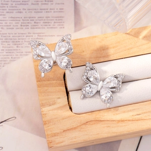 Elegant butterfly stud earrings with silver finish and transparent pear-cut gemstones