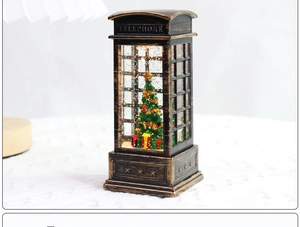 Close-up of a vintage bronze Christmas lantern globe with glitter and lighted tree inside