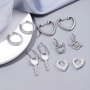 6-pair silver hoop earring set with heart pendants and crystal embellishments