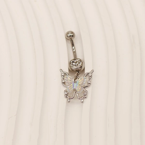 Detail of silver butterfly navel ring with iridescent wings and sparkling crystals
