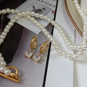 Elegant 18k gold plated stainless steel hoop earrings with square white zircon pendants