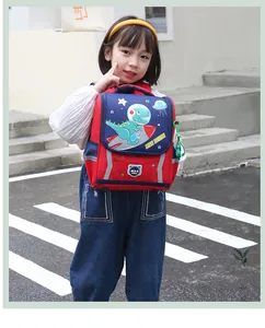 Close-up of a child wearing a colorful dinosaur astronaut backpack with breathable mesh straps