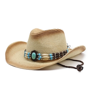 Close-up of bohemian woven cowboy hat with turquoise beadwork and adjustable chin strap
