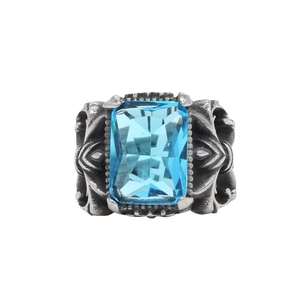 Retro punk titanium steel ring with rectangular light blue gem and engraved patterns