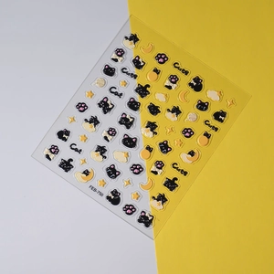 Detail of 3D embossed black cat nail stickers featuring stars and moon designs FEB-750