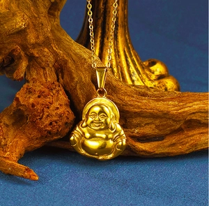 Detailed view of a 24K gold-plated Laughing Buddha pendant on a classic O-chain