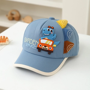 Close-up of kids light blue baseball cap featuring a cartoon dinosaur driving a car