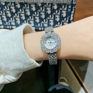 Elegant ladies silver quartz watch featuring a sparkling rhinestone bezel and starry dial