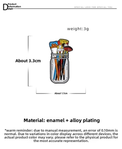 Detail of colorful enamel paintbrush jar pin showing alloy plating and vibrant textures