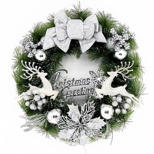 Silver 40cm Christmas wreath with reindeer, large bow, and frosted berries on white background