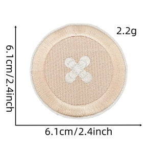 Detail view of round beige embroidered patch with size 6.1cm and 2.4 inch measurements