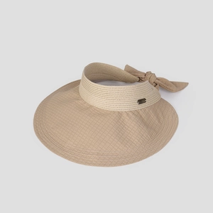 Detail of beige sun visor with checkered brim and elegant bow decoration at back