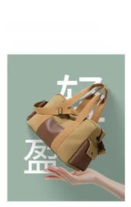 Lightweight khaki canvas travel bag with brown leather base held by hand showing 0.38kg weight