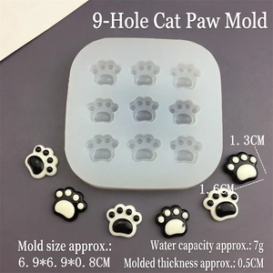 Detail view of cat paw silicone mold showing 9 cavities with precise dimensions and size