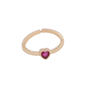 Exquisite gold ring featuring heart-cut red gemstone on adjustable band for women